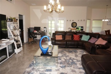 Impressive 4 Bedroom, 3 Bathroom home with attached 3 Car Garage on Deep Creek Golf Club in Florida - for sale on GolfHomes.com, golf home, golf lot