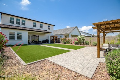Step into timeless elegance in this stunning 2021 Craftsman home on Verrado Golf Club - Victory in Arizona - for sale on GolfHomes.com, golf home, golf lot