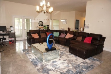 Impressive 4 Bedroom, 3 Bathroom home with attached 3 Car Garage on Deep Creek Golf Club in Florida - for sale on GolfHomes.com, golf home, golf lot
