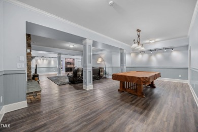This spacious 6,785 square foot home with 5 bedrooms, 5 full on Hasentree Club in North Carolina - for sale on GolfHomes.com, golf home, golf lot