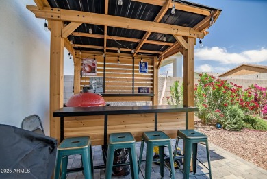 Step into timeless elegance in this stunning 2021 Craftsman home on Verrado Golf Club - Victory in Arizona - for sale on GolfHomes.com, golf home, golf lot