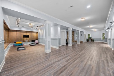 This spacious 6,785 square foot home with 5 bedrooms, 5 full on Hasentree Club in North Carolina - for sale on GolfHomes.com, golf home, golf lot