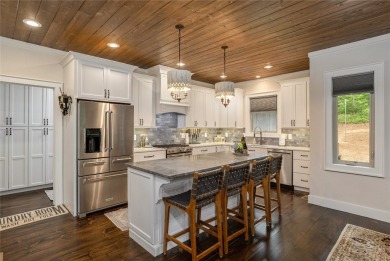 Experience the perfect harmony of easy outdoor living and on Natures Walk At Chinquapin in North Carolina - for sale on GolfHomes.com, golf home, golf lot