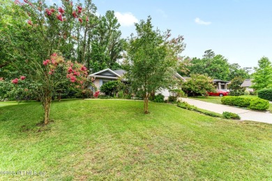 Tucked between Turkey Creek Golf Course and the San Felasco on Turkey Creek Golf and Country Club in Florida - for sale on GolfHomes.com, golf home, golf lot