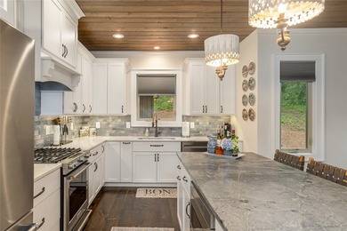 Experience the perfect harmony of easy outdoor living and on Natures Walk At Chinquapin in North Carolina - for sale on GolfHomes.com, golf home, golf lot