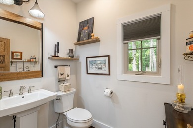 Experience the perfect harmony of easy outdoor living and on Natures Walk At Chinquapin in North Carolina - for sale on GolfHomes.com, golf home, golf lot