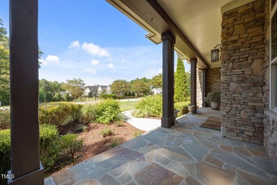 This spacious 6,785 square foot home with 5 bedrooms, 5 full on Hasentree Club in North Carolina - for sale on GolfHomes.com, golf home, golf lot