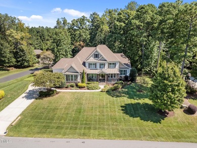 This spacious 6,785 square foot home with 5 bedrooms, 5 full on Hasentree Club in North Carolina - for sale on GolfHomes.com, golf home, golf lot