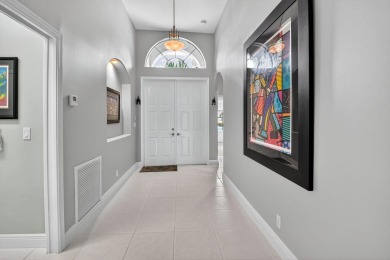 Experience lakefront living at it finest in this immaculate on Gleneagles Golf and Country Club in Florida - for sale on GolfHomes.com, golf home, golf lot