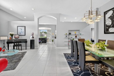 Experience lakefront living at it finest in this immaculate on Gleneagles Golf and Country Club in Florida - for sale on GolfHomes.com, golf home, golf lot