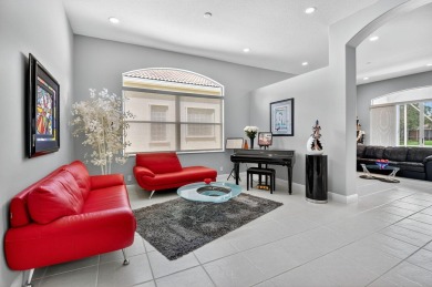 Experience lakefront living at it finest in this immaculate on Gleneagles Golf and Country Club in Florida - for sale on GolfHomes.com, golf home, golf lot