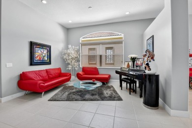 Experience lakefront living at it finest in this immaculate on Gleneagles Golf and Country Club in Florida - for sale on GolfHomes.com, golf home, golf lot