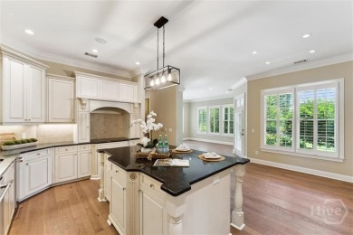 Step into timeless elegance in this beautifully crafted brick on Savannah Quarters Country Club in Georgia - for sale on GolfHomes.com, golf home, golf lot