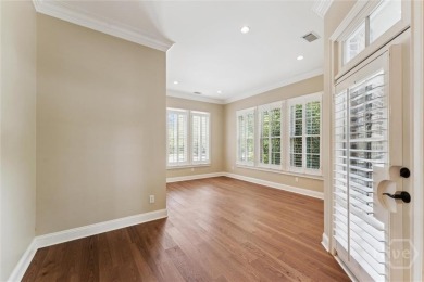 Step into timeless elegance in this beautifully crafted brick on Savannah Quarters Country Club in Georgia - for sale on GolfHomes.com, golf home, golf lot
