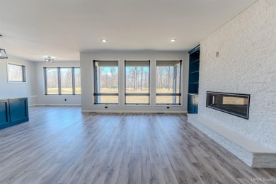 Experience refined modern living in this stunning 2025 on Indian Lake Golf and Country Club in Michigan - for sale on GolfHomes.com, golf home, golf lot