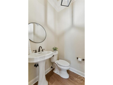 Step into timeless elegance in this beautifully crafted brick on Savannah Quarters Country Club in Georgia - for sale on GolfHomes.com, golf home, golf lot