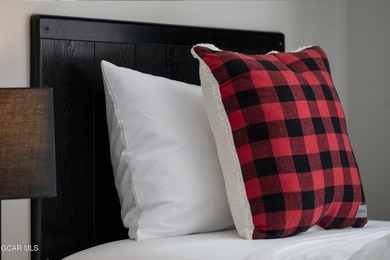 Ski-In, Ski-Out 2-Bedroom, 2-Bath Condo with Proven Rental on Headwaters Golf Course At Granby Ranch in Colorado - for sale on GolfHomes.com, golf home, golf lot