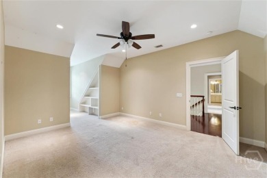 Step into timeless elegance in this beautifully crafted brick on Savannah Quarters Country Club in Georgia - for sale on GolfHomes.com, golf home, golf lot