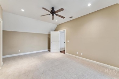 Step into timeless elegance in this beautifully crafted brick on Savannah Quarters Country Club in Georgia - for sale on GolfHomes.com, golf home, golf lot