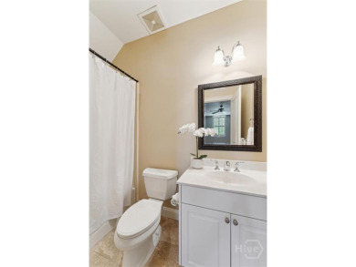 Step into timeless elegance in this beautifully crafted brick on Savannah Quarters Country Club in Georgia - for sale on GolfHomes.com, golf home, golf lot