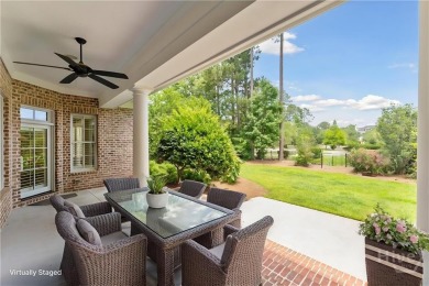 Step into timeless elegance in this beautifully crafted brick on Savannah Quarters Country Club in Georgia - for sale on GolfHomes.com, golf home, golf lot