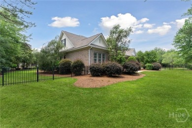 Step into timeless elegance in this beautifully crafted brick on Savannah Quarters Country Club in Georgia - for sale on GolfHomes.com, golf home, golf lot