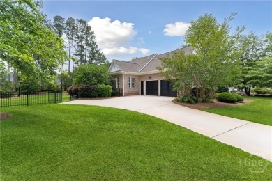 Step into timeless elegance in this beautifully crafted brick on Savannah Quarters Country Club in Georgia - for sale on GolfHomes.com, golf home, golf lot