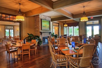 Step into timeless elegance in this beautifully crafted brick on Savannah Quarters Country Club in Georgia - for sale on GolfHomes.com, golf home, golf lot