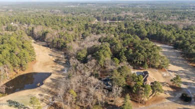 Large golf front lot on a cul-de-sac with great views of the 4th on Seven Lakes Country Club in North Carolina - for sale on GolfHomes.com, golf home, golf lot