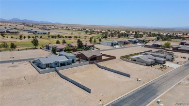 This vacant lot in the Los Lagos Greens subdivision is a on Los Lagos Golf Club in Arizona - for sale on GolfHomes.com, golf home, golf lot
