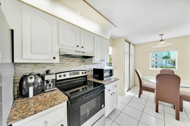 Spacious 2 bedroom, 2 bath condo in the lovely Dorchester at on Poinciana Golf Club in Florida - for sale on GolfHomes.com, golf home, golf lot