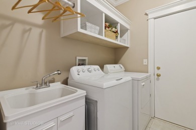 This very spacious 5-bedroom home, situated on a premium, fenced on Carillon Lakes 3 Hole Course in Illinois - for sale on GolfHomes.com, golf home, golf lot