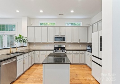 Experience luxury living in this exquisite 3 story, 6 bedroom, 4 on The Palisades Country Club in North Carolina - for sale on GolfHomes.com, golf home, golf lot