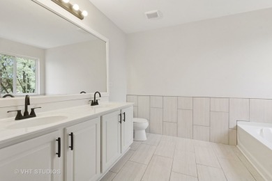 This very spacious 5-bedroom home, situated on a premium, fenced on Carillon Lakes 3 Hole Course in Illinois - for sale on GolfHomes.com, golf home, golf lot