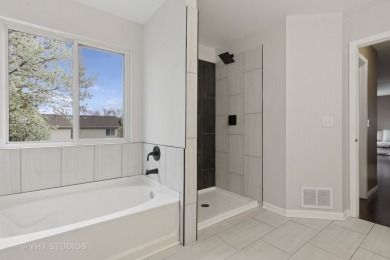 This very spacious 5-bedroom home, situated on a premium, fenced on Carillon Lakes 3 Hole Course in Illinois - for sale on GolfHomes.com, golf home, golf lot