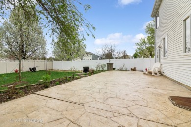 This very spacious 5-bedroom home, situated on a premium, fenced on Carillon Lakes 3 Hole Course in Illinois - for sale on GolfHomes.com, golf home, golf lot