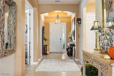 A must see beautiful home in the gated community of Entrada in on Sabal Springs Golf and Racquet Club in Florida - for sale on GolfHomes.com, golf home, golf lot