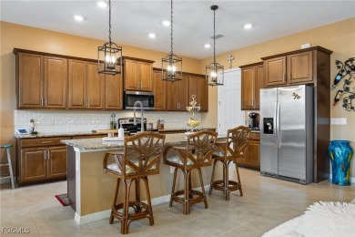 A must see beautiful home in the gated community of Entrada in on Sabal Springs Golf and Racquet Club in Florida - for sale on GolfHomes.com, golf home, golf lot