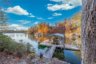 From its splendidly landscaped--and conveniently level--front on The Cliffs At Keowee Vineyards Golf Club in South Carolina - for sale on GolfHomes.com, golf home, golf lot