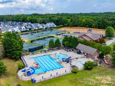Experience luxury living in this exquisite 3 story, 6 bedroom, 4 on The Palisades Country Club in North Carolina - for sale on GolfHomes.com, golf home, golf lot