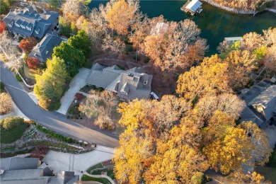 From its splendidly landscaped--and conveniently level--front on The Cliffs At Keowee Vineyards Golf Club in South Carolina - for sale on GolfHomes.com, golf home, golf lot