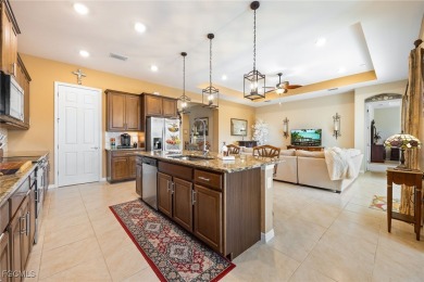 A must see beautiful home in the gated community of Entrada in on Sabal Springs Golf and Racquet Club in Florida - for sale on GolfHomes.com, golf home, golf lot