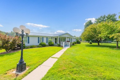 Stunning 3 bedroom, 2 bath double wide home sits on a sprawling on Panther Creek Golf Course in Kentucky - for sale on GolfHomes.com, golf home, golf lot