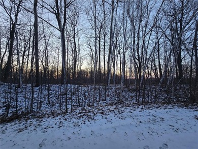 Escape to your own private retreat on this rolling, wooded 0 on Hardwoods Golf Club At Mille Lacs in Minnesota - for sale on GolfHomes.com, golf home, golf lot