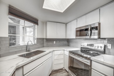 Enter to find living room w/vaulted ceilings flooded with on Stonecreek Golf Club in Arizona - for sale on GolfHomes.com, golf home, golf lot