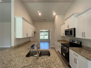 THIS BEAUTIFUL BRAND NEW ADAMS HOME IS MOVE IN READY AND WAITING on Kingsway Country Club in Florida - for sale on GolfHomes.com, golf home, golf lot