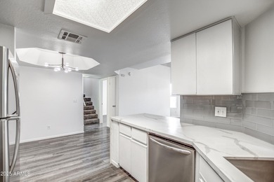 Enter to find living room w/vaulted ceilings flooded with on Stonecreek Golf Club in Arizona - for sale on GolfHomes.com, golf home, golf lot