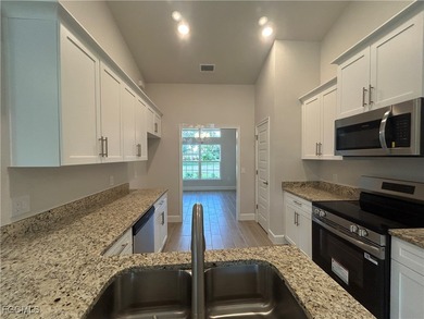 THIS BEAUTIFUL BRAND NEW ADAMS HOME IS MOVE IN READY AND WAITING on Kingsway Country Club in Florida - for sale on GolfHomes.com, golf home, golf lot