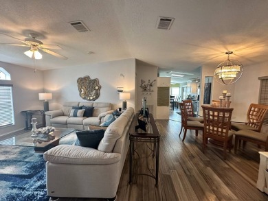 Discover your dream lifestyle in this stunning 3-bedroom, 2-bath on Four Lakes Golf Club in Florida - for sale on GolfHomes.com, golf home, golf lot