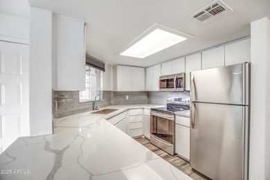 Enter to find living room w/vaulted ceilings flooded with on Stonecreek Golf Club in Arizona - for sale on GolfHomes.com, golf home, golf lot